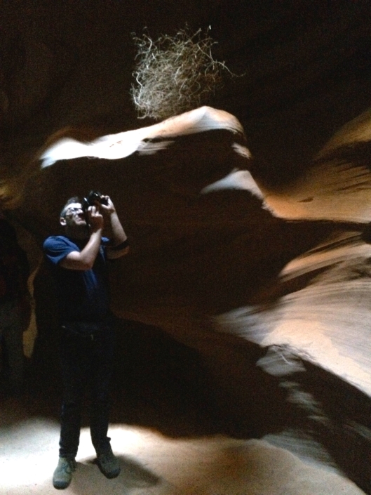 Snapshot of a man photographing Antelope Canyon