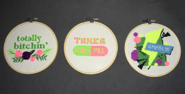 Cross-stitches with neon designs