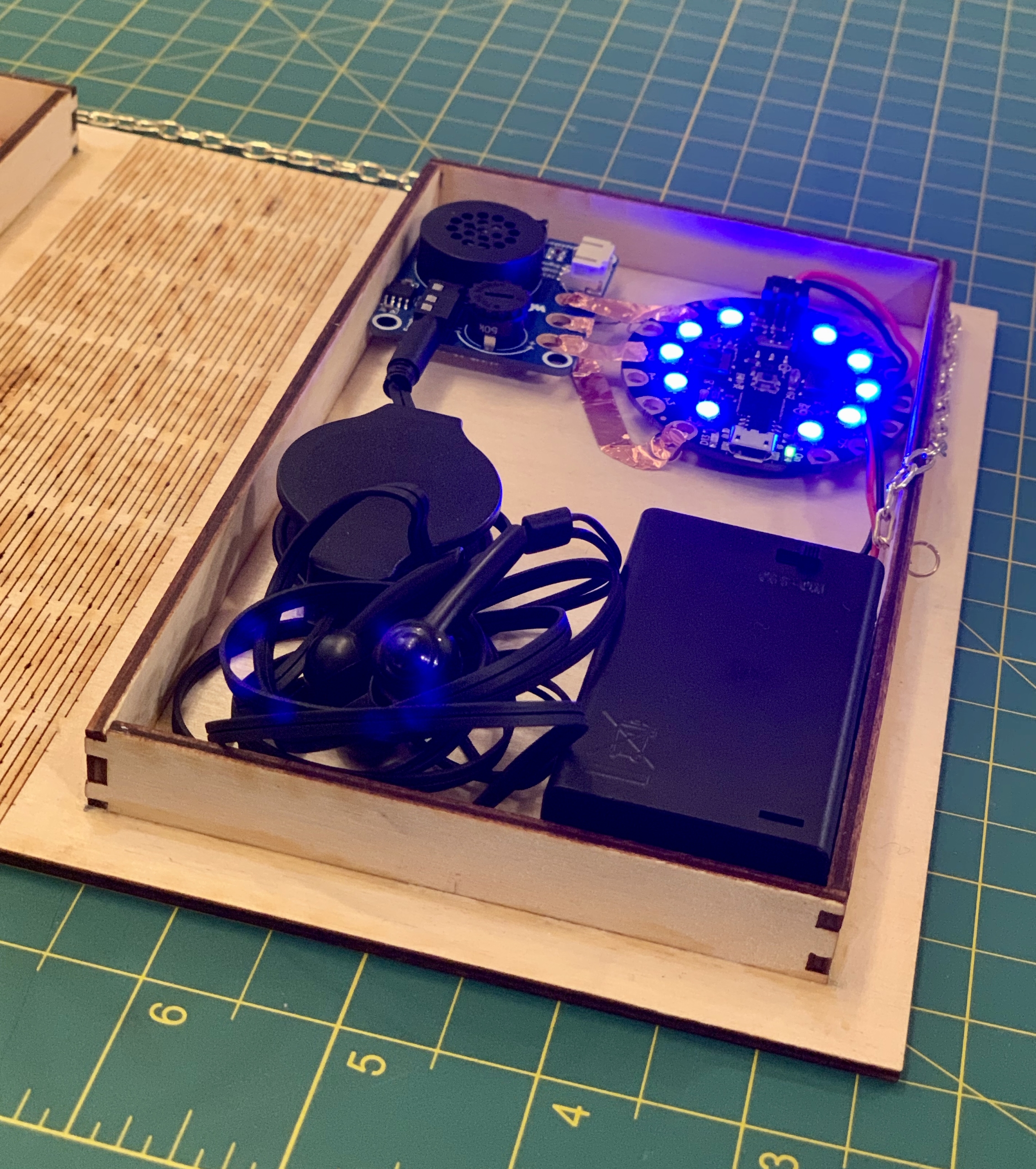 Detailed view of lit-up microcontroller with blue lights